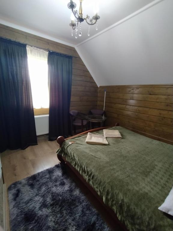 Postel nebo postele na pokoji v ubytování Чистий Спокій