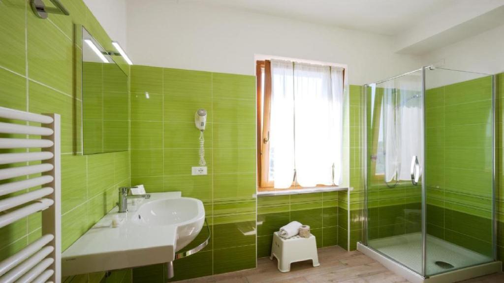 Koupelna v ubytování Hotel Porta Romana di Luce Hotels