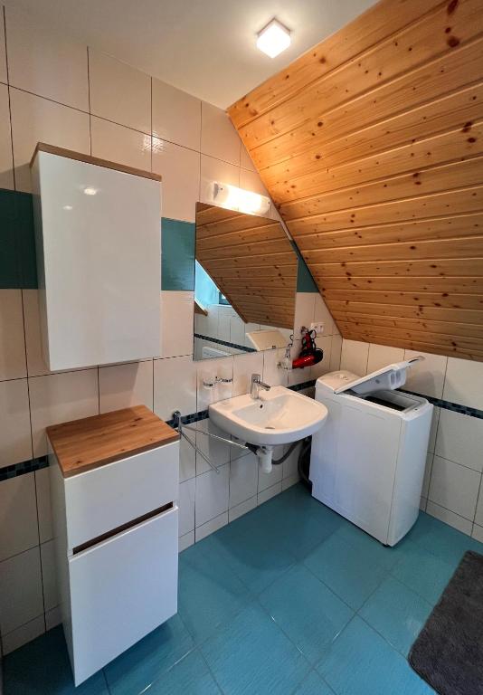Kuchyň nebo kuchyňský kout v ubytování HOFBERG Apartmán
