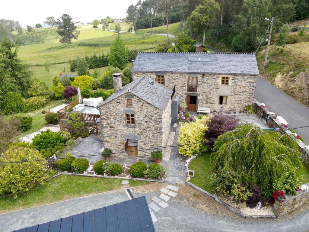 an aerial view of a stone house at Casa Piñeiro in Monfero