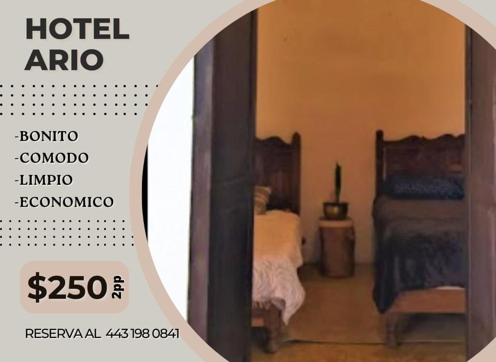 Postel nebo postele na pokoji v ubytování Hotel Ario