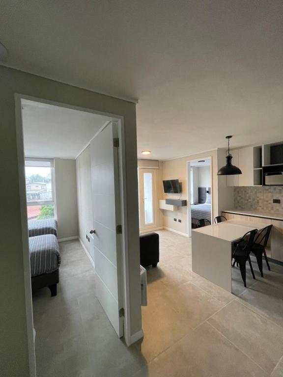 Kuchyň nebo kuchyňský kout v ubytování Epicentro Suites Apart Hotel - Valdivia