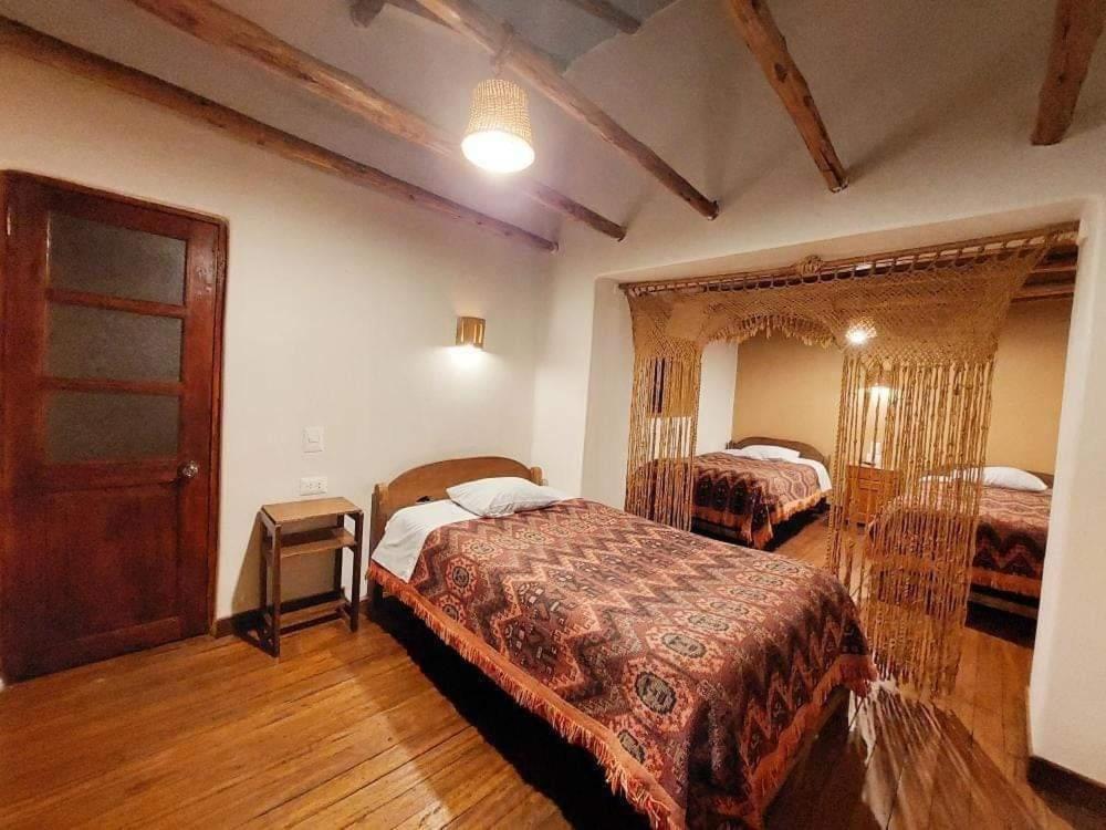 Postel nebo postele na pokoji v ubytování Mirador de la Ñusta