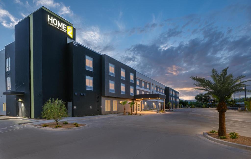 a large black building with a hotel sign on it at Home2 Suites By Hilton Lake Havasu City in Lake Havasu City
