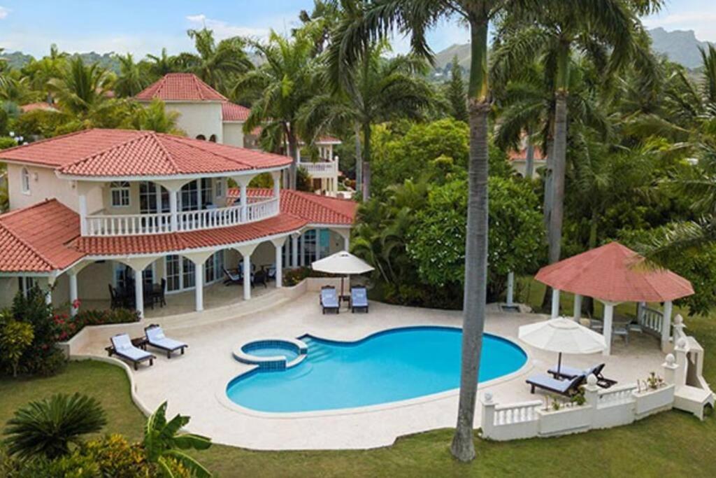 an aerial view of a house with a swimming pool at Your Home Away From Home in San Felipe de Puerto Plata