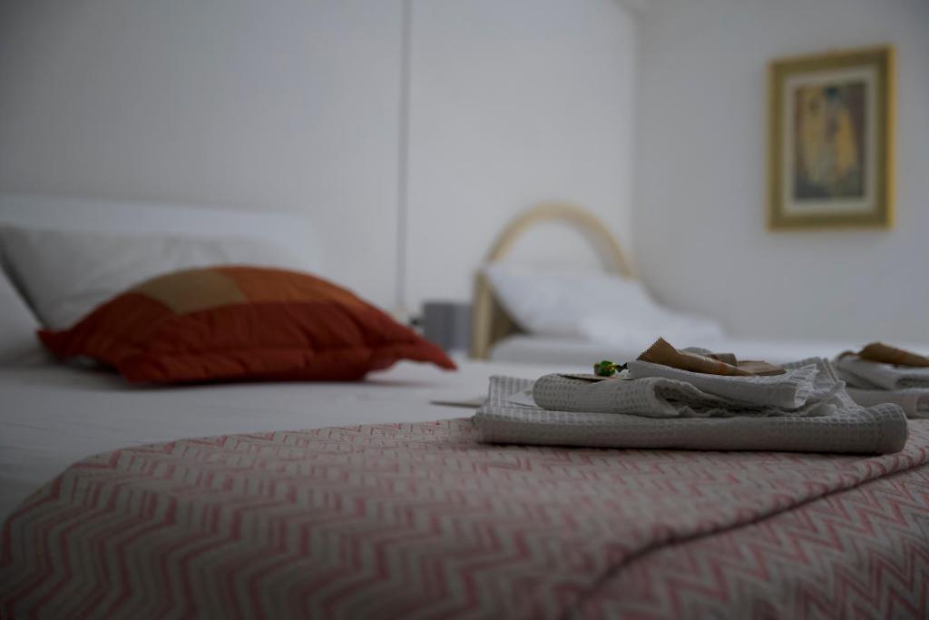 Posteľ alebo postele v izbe v ubytovaní Appartamento Casa Tonina