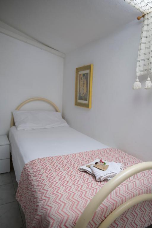 Posteľ alebo postele v izbe v ubytovaní Appartamento Casa Tonina