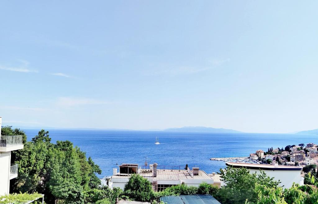 a view of the ocean from a building at Apartment Volosko View in Opatija