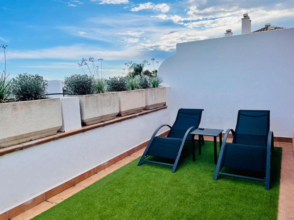 Fotografie z fotogalerie ubytování Lovely 3-bedroom townhouse with shared pool v destinaci Estepona
