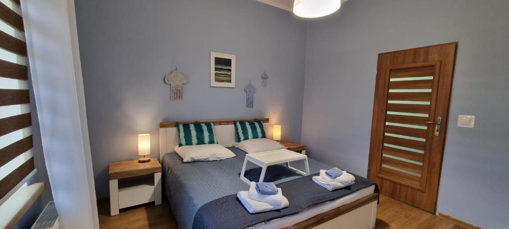 Katil atau katil-katil dalam bilik di Apartament Cumulus