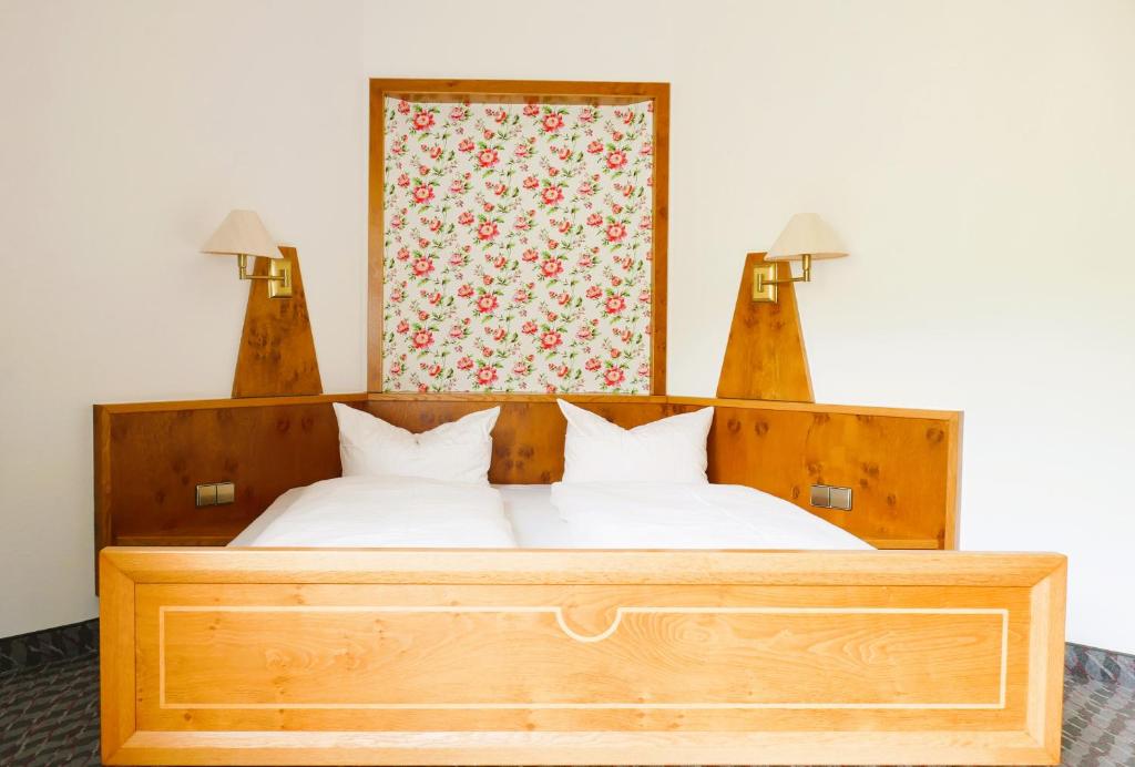 Postel nebo postele na pokoji v ubytování Hotel Sonne