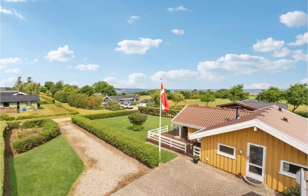 an aerial view of a house with a flag at Gorgeous Home In Fars With Wifi in Farsø