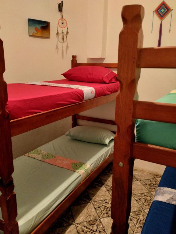 Postel nebo postele na pokoji v ubytování Jurema Hostel