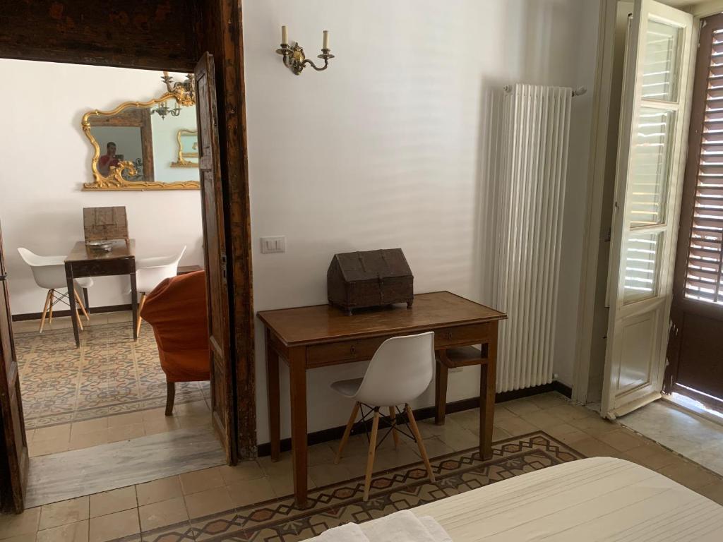 Łóżko lub łóżka w pokoju w obiekcie FraLePorte Vintage Apartment