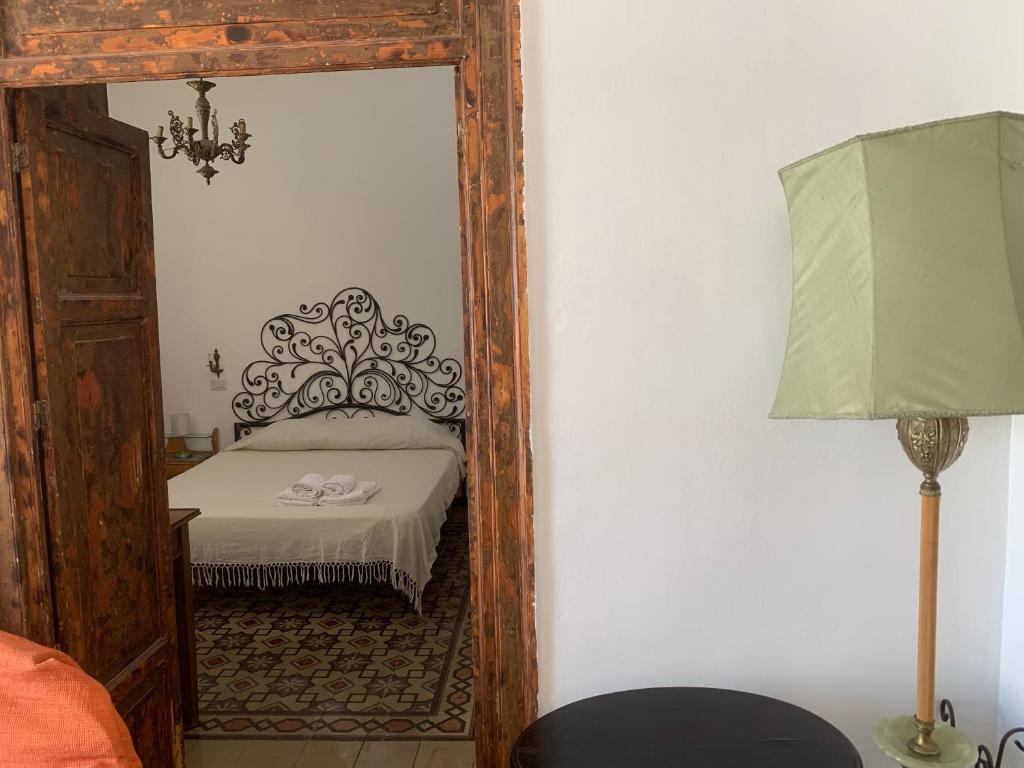 Łóżko lub łóżka w pokoju w obiekcie FraLePorte Vintage Apartment