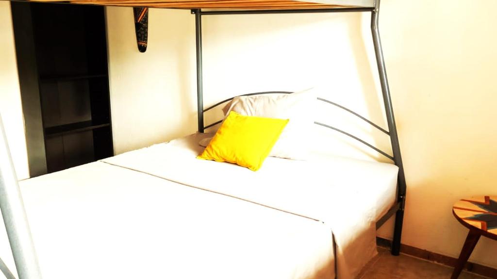 Postel nebo postele na pokoji v ubytování Casa de descanso acacias meta