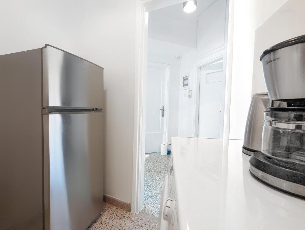 Kuchyňa alebo kuchynka v ubytovaní Super Paradise Apartments