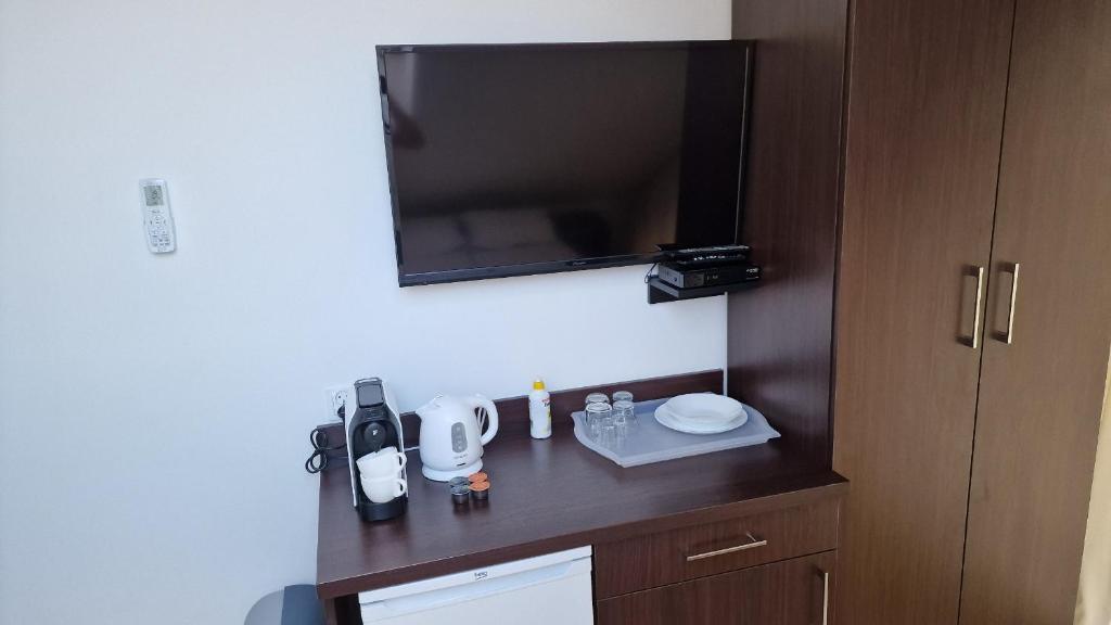 TV a/nebo společenská místnost v ubytování Gęsi Puch