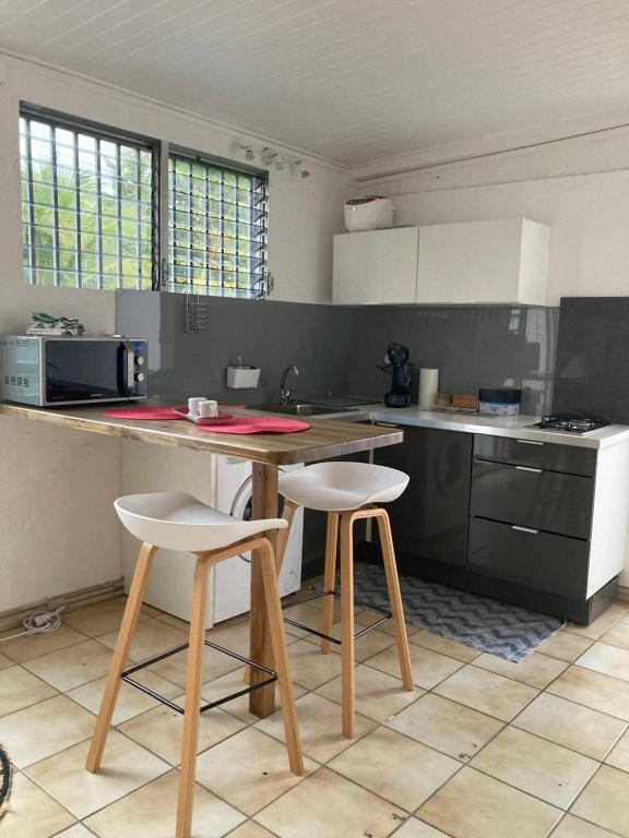Kuchyň nebo kuchyňský kout v ubytování T2 Ti Joe Au cœur de Guadeloupe