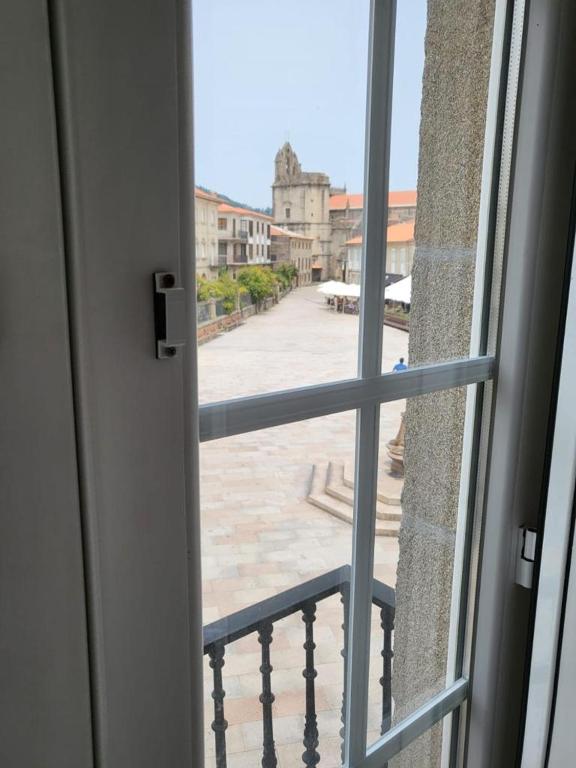 a view of a balcony from a window at CASA MARUXA pensión in Pontevedra