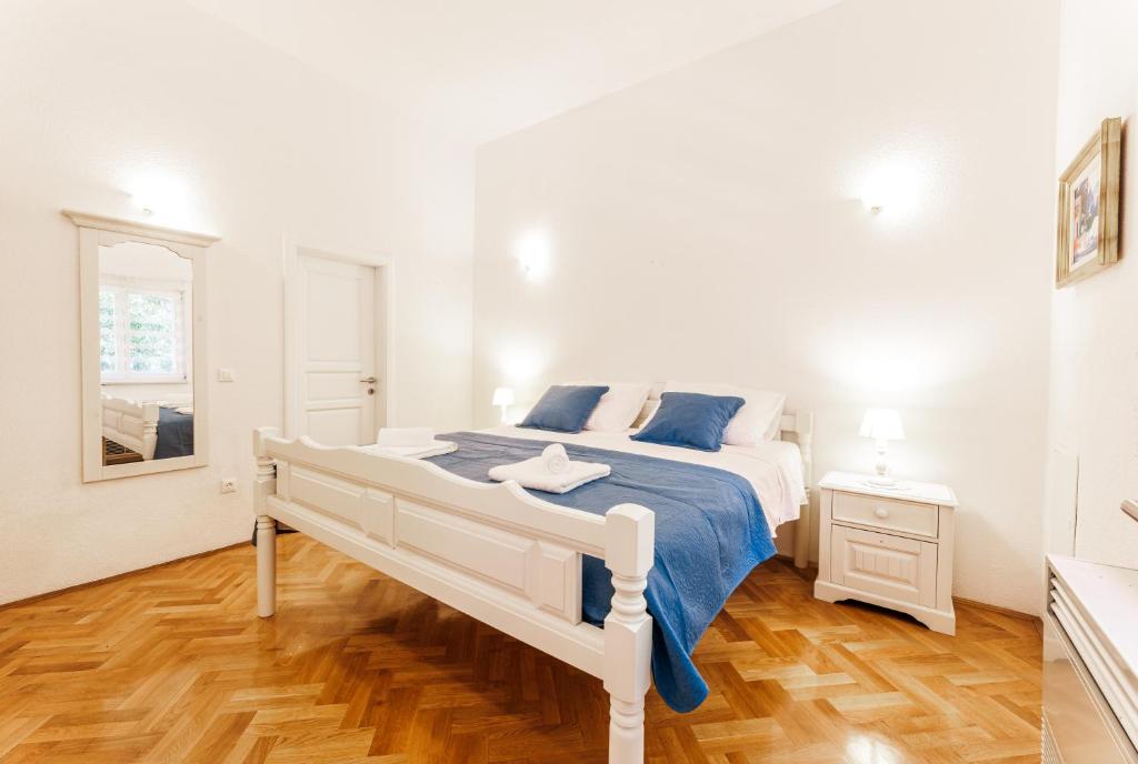 Voodi või voodid majutusasutuse Villa Atrium toas