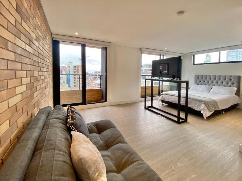 Voodi või voodid majutusasutuse Hermosa Vista en Chapinero cómodo wifi toas