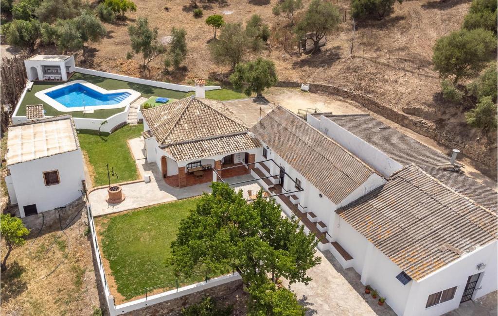 an aerial view of a house with a swimming pool at Nice Home In Algar With Outdoor Swimming Pool, Wifi And 7 Bedrooms in Algar
