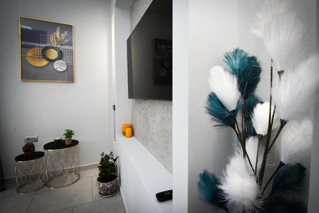 TV a/nebo společenská místnost v ubytování Nefeli Apartment