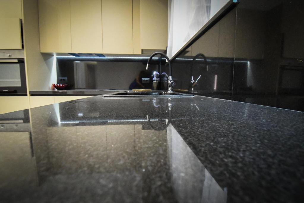 Kuchyň nebo kuchyňský kout v ubytování Nefeli Apartment