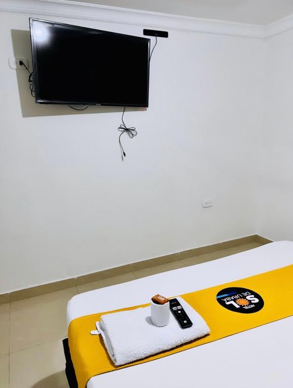TV a/nebo společenská místnost v ubytování Hotel sol de uraba