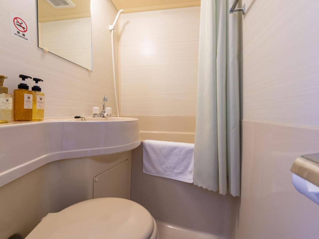 Koupelna v ubytování Travel Inn Kofu