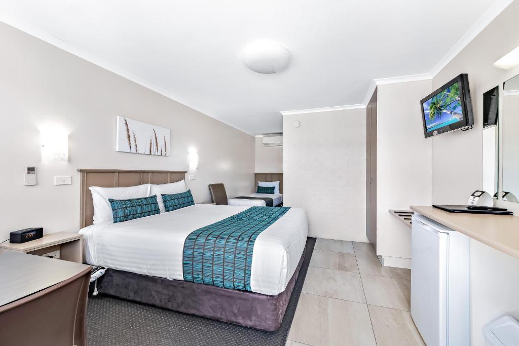 Voodi või voodid majutusasutuse Apple & Grape Motel toas