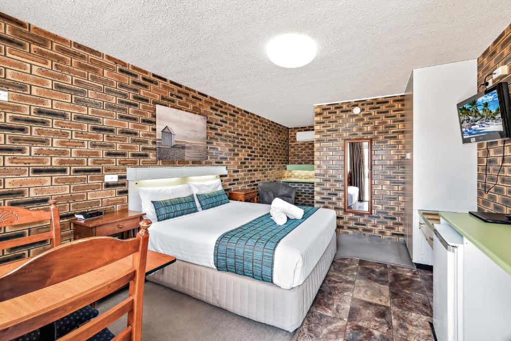 Voodi või voodid majutusasutuse Apple & Grape Motel toas
