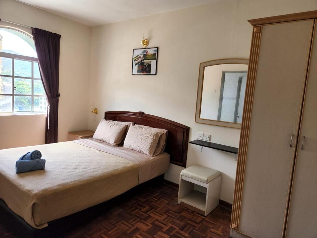 Postel nebo postele na pokoji v ubytování The Little Star Studio Hotel- Star Regency