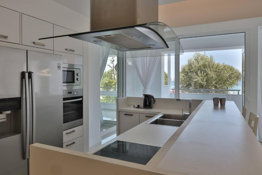 Kuchyň nebo kuchyňský kout v ubytování Soi's Apartment I