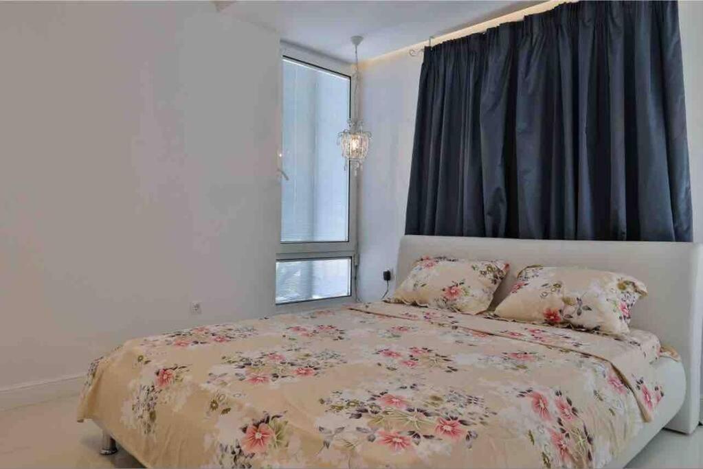 Postel nebo postele na pokoji v ubytování Soi's Apartment I