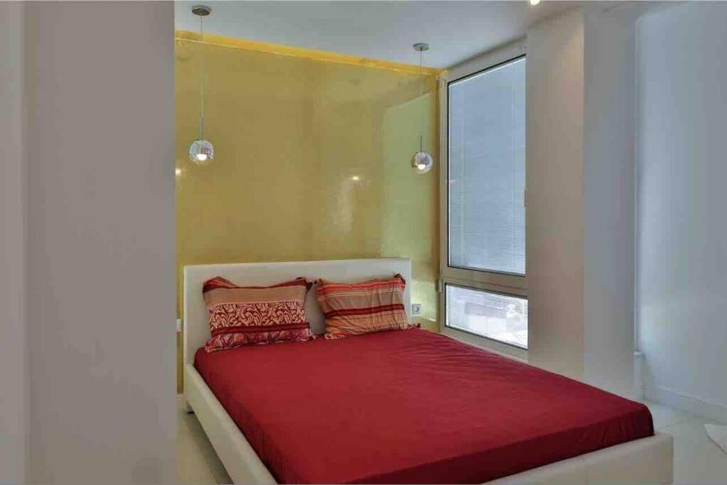 Postel nebo postele na pokoji v ubytování Soi's Apartment I