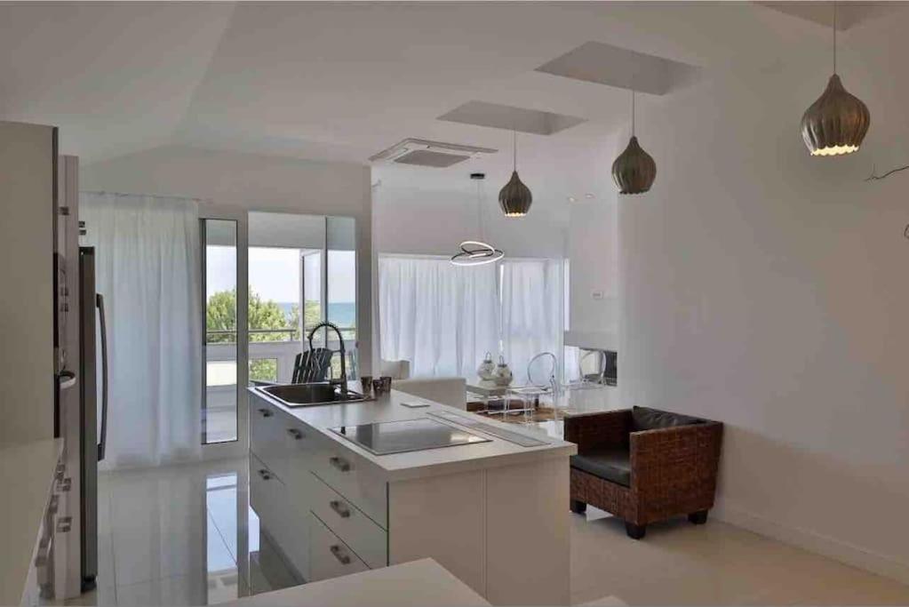 Kuchyň nebo kuchyňský kout v ubytování Soi's Apartment II