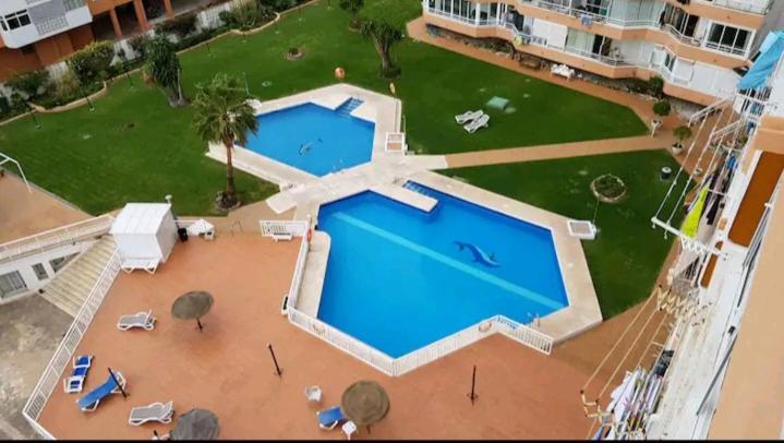 Bazén v ubytovaní Macarena´s Home *Sea view*-Saltillo Alto alebo v jeho blízkosti