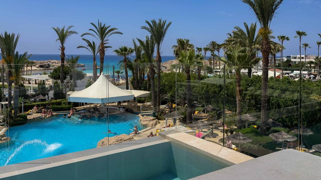 a view of the pool at the resort at Tasia Maris Beach Hotel - Adults Only in Ayia Napa