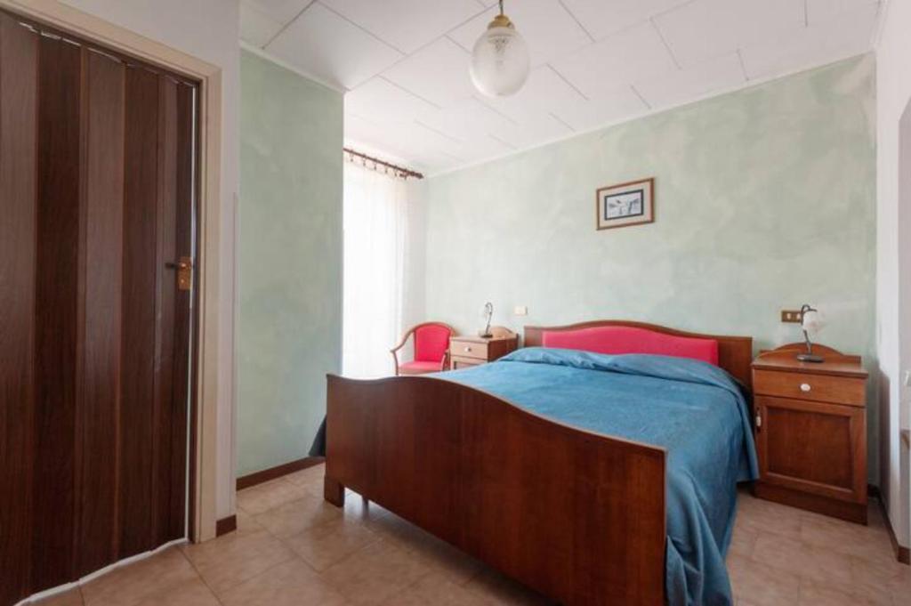 Postel nebo postele na pokoji v ubytování Albergo Miramonti
