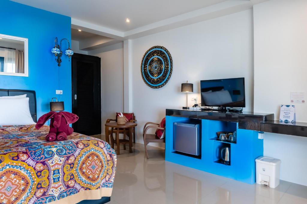 TV a/nebo společenská místnost v ubytování Crystal Bay Beach Resort
