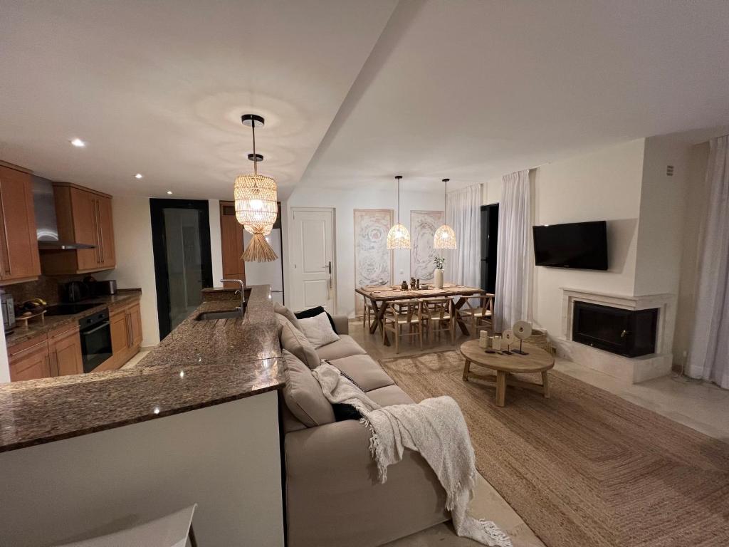 Televízia a/alebo spoločenská miestnosť v ubytovaní Vista apartment