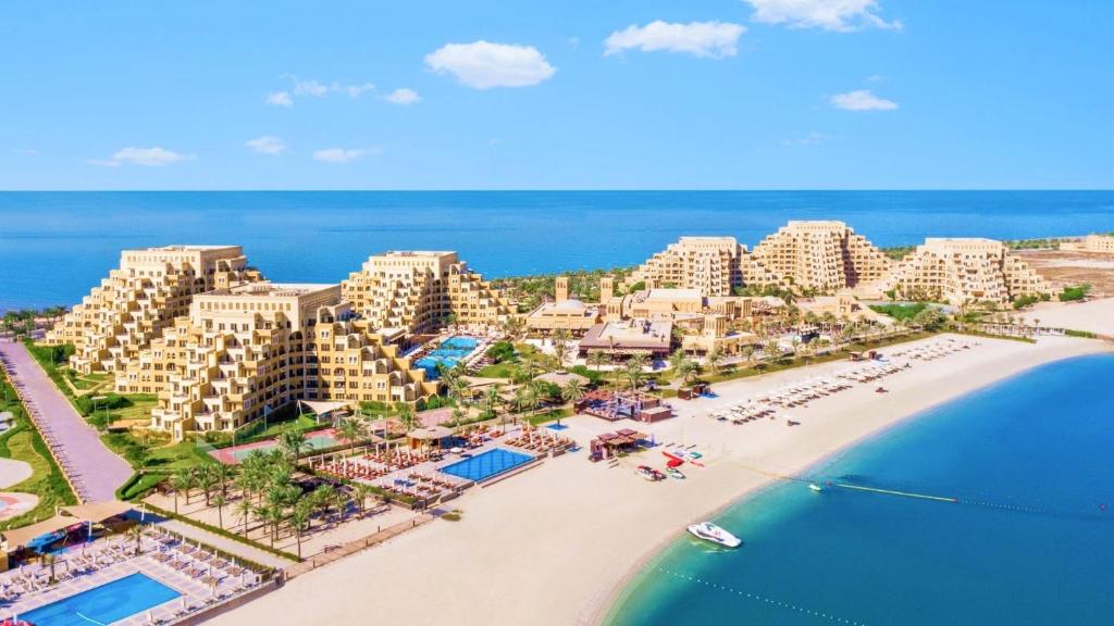 an aerial view of the resort and the beach at Luxury see view studio Al Marjan in Ras al Khaimah