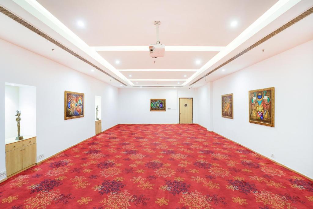 Postel nebo postele na pokoji v ubytování Lemon Tree Premier 1, Gurugram