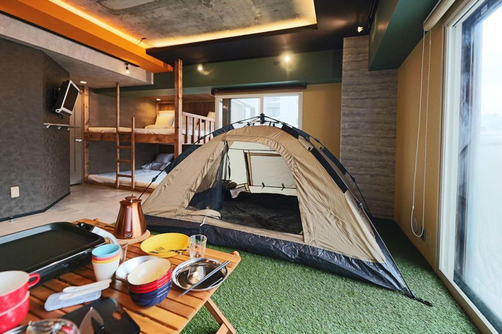 A seating area at MolinHotels506 アクティビティを満喫できる札幌定山渓 天然温泉付- CampRoom S-Beds6