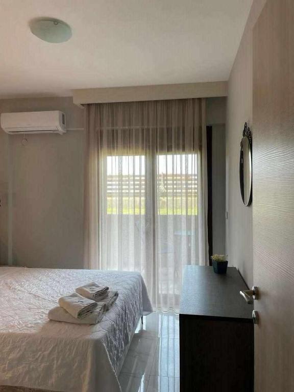 Sinodinos Deluxe Apartments - Economy Quadruple Room