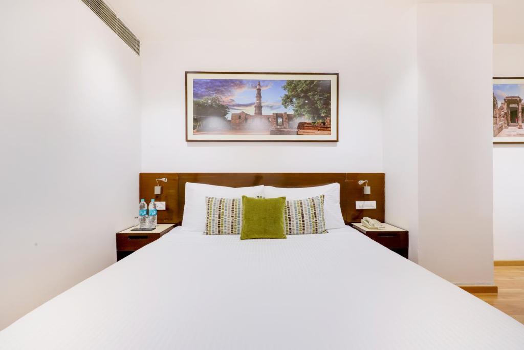 Postel nebo postele na pokoji v ubytování Lemon Tree Premier 1, Gurugram