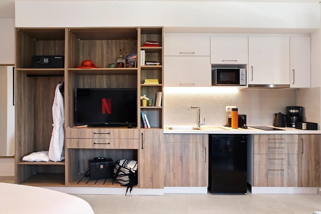 Kuchyň nebo kuchyňský kout v ubytování Sigma Residences Hotel