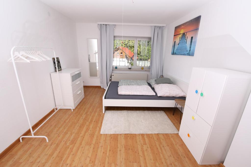 Postel nebo postele na pokoji v ubytování Moderne, herzliche und große Ferienwohnung mitten im Naturpark